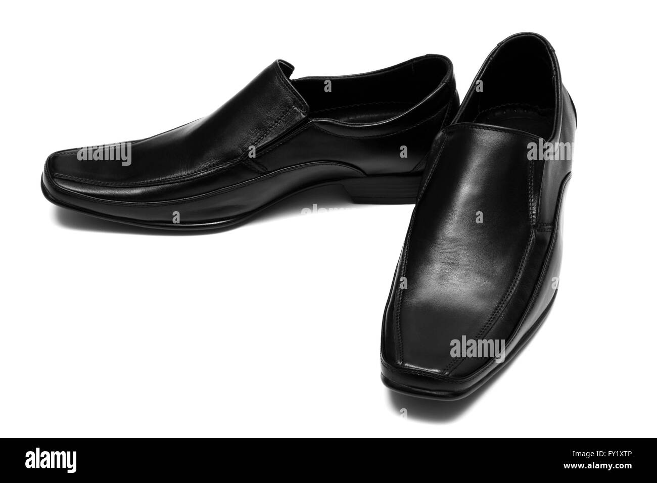 Chaussures basses noir sur fond blanc Banque D'Images