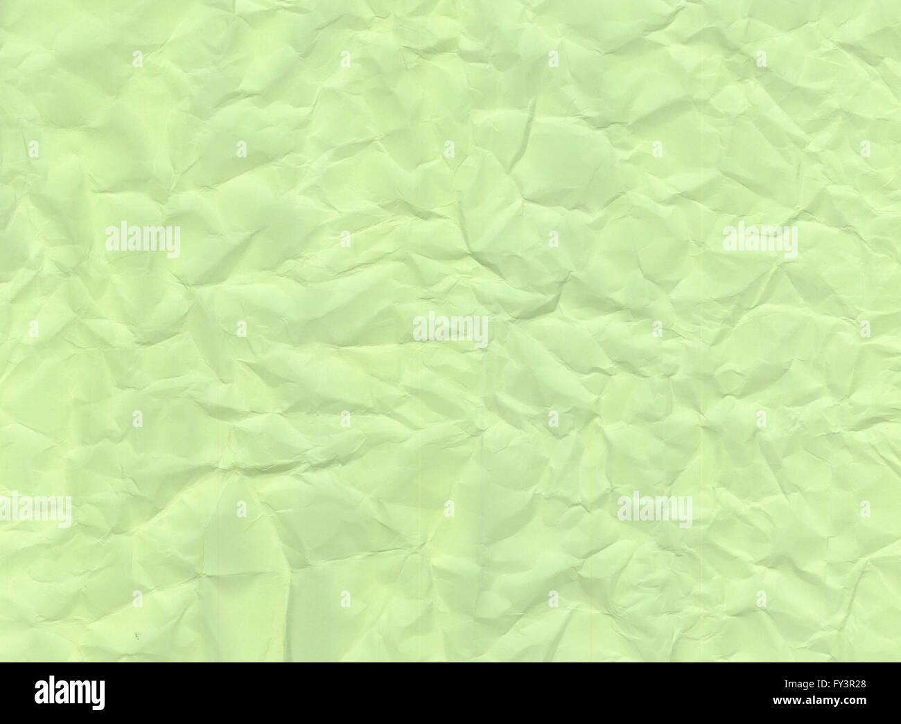 La texture du papier vert froissé pour concevoir l'arrière-plan. Banque D'Images