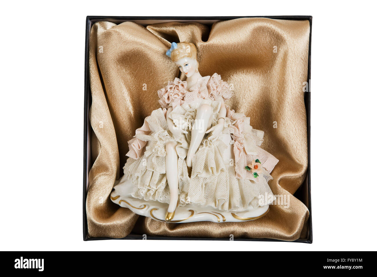 Poupée porcelaine élégante antiquaire dans une boîte Banque D'Images