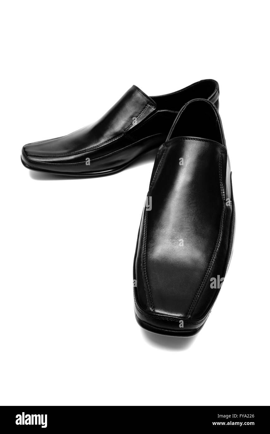 Chaussures basses noir sur fond blanc Banque D'Images