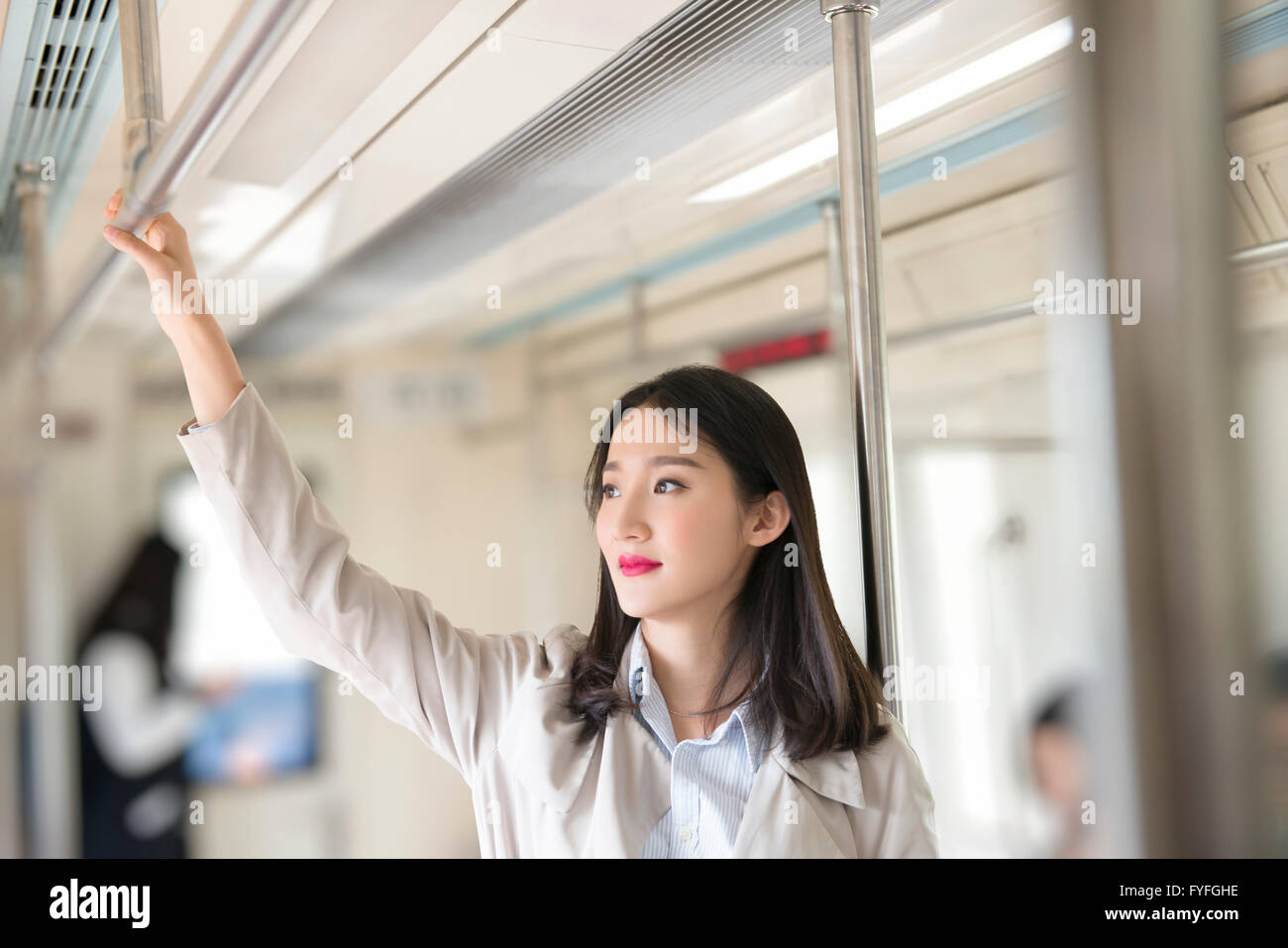 Businesswoman in subway Banque D'Images