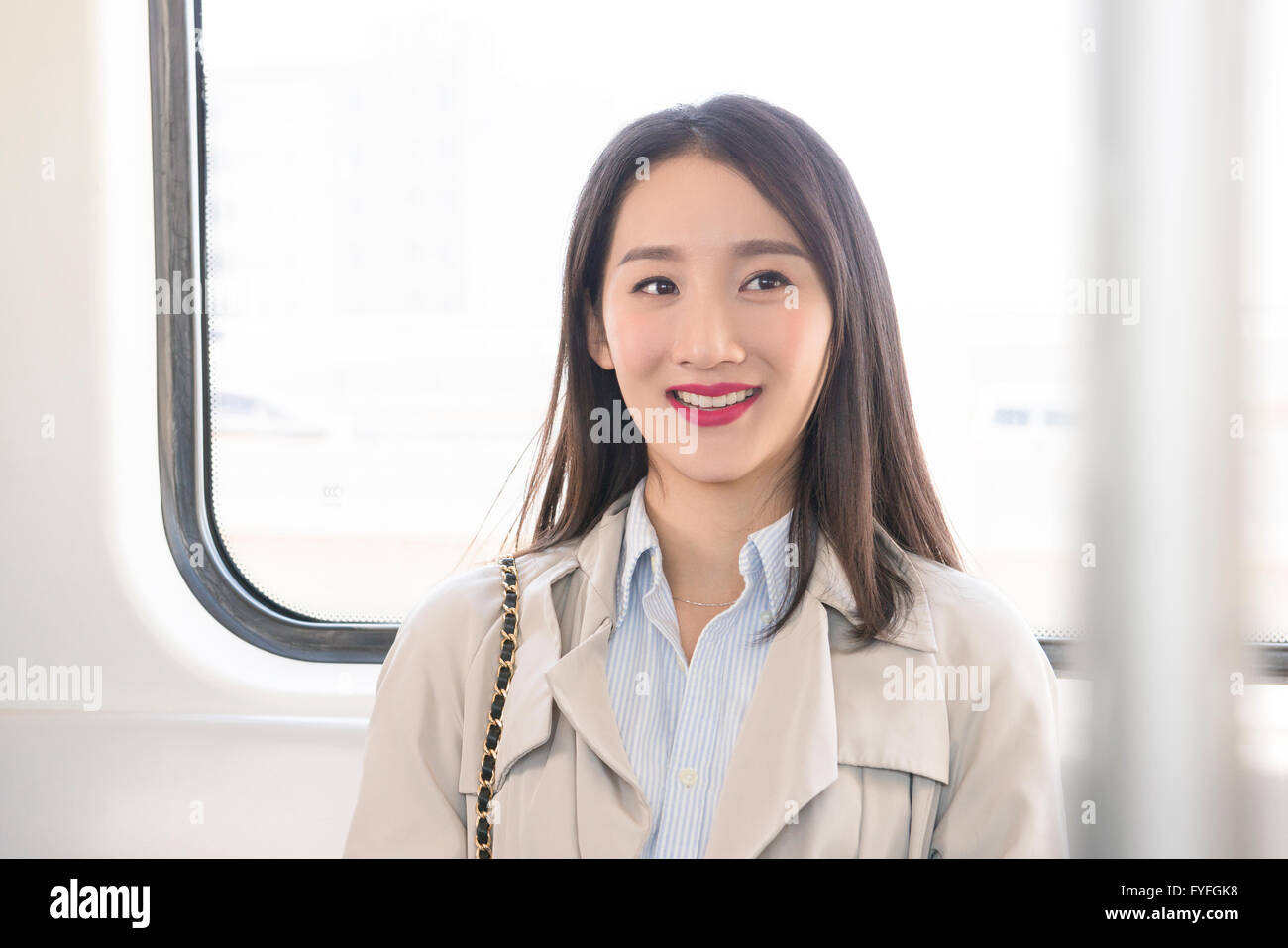 Businesswoman in subway Banque D'Images