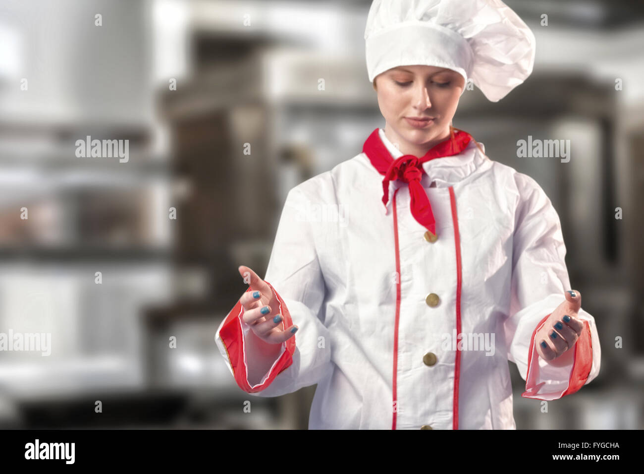 Image composite de jolie chef standing with hands out Banque D'Images