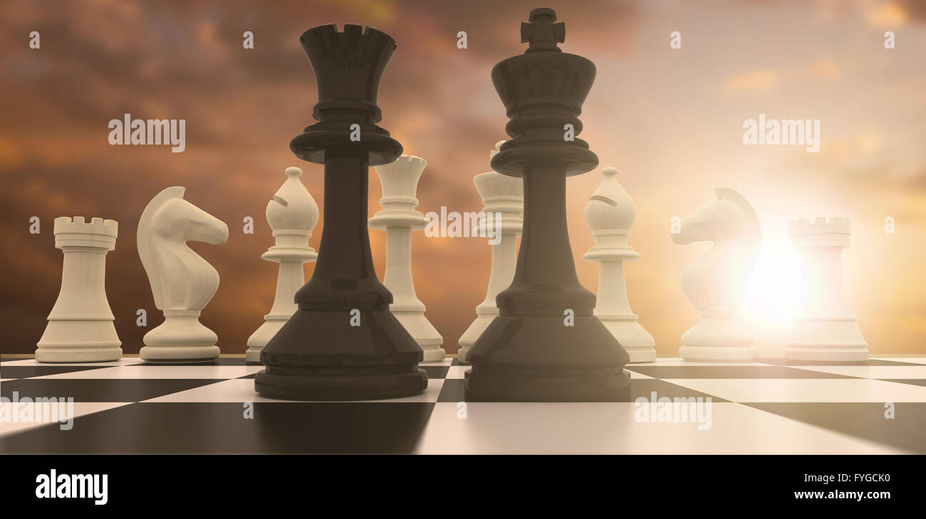 Image composite du roi noir et de la reine debout devant des pièces blanches Banque D'Images