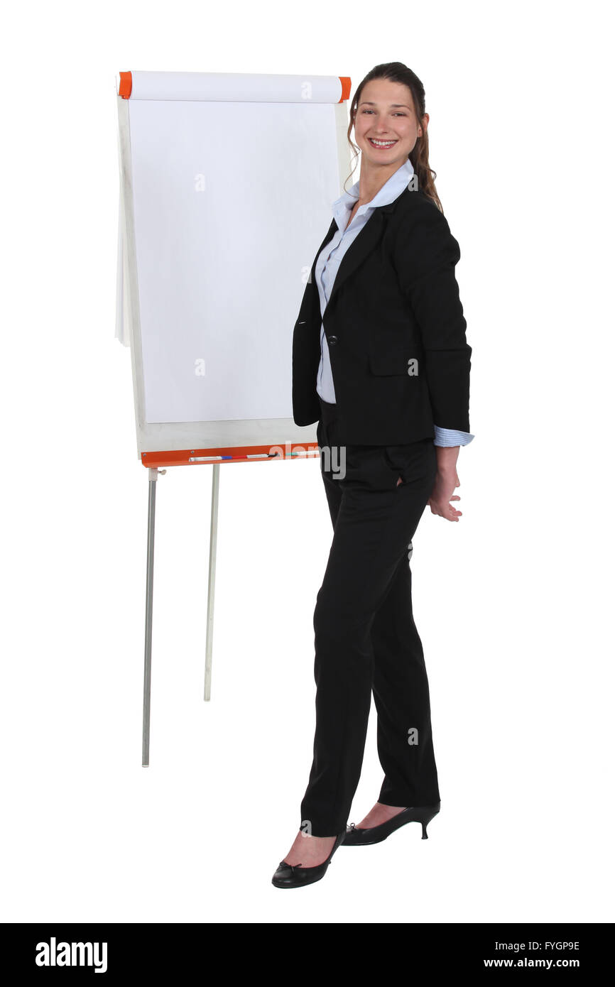 Young businesswoman près de carton au cours de réunion Banque D'Images