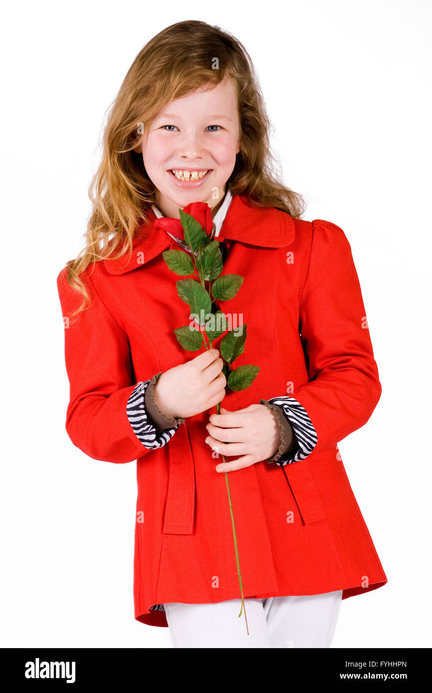 Douce jeune fille avec une rose Banque D'Images