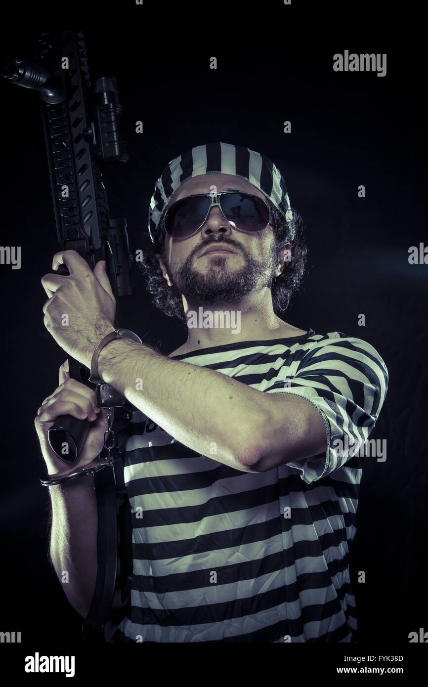 L'opposition, prisonnier dans une prison avec une mitrailleuse Banque D'Images