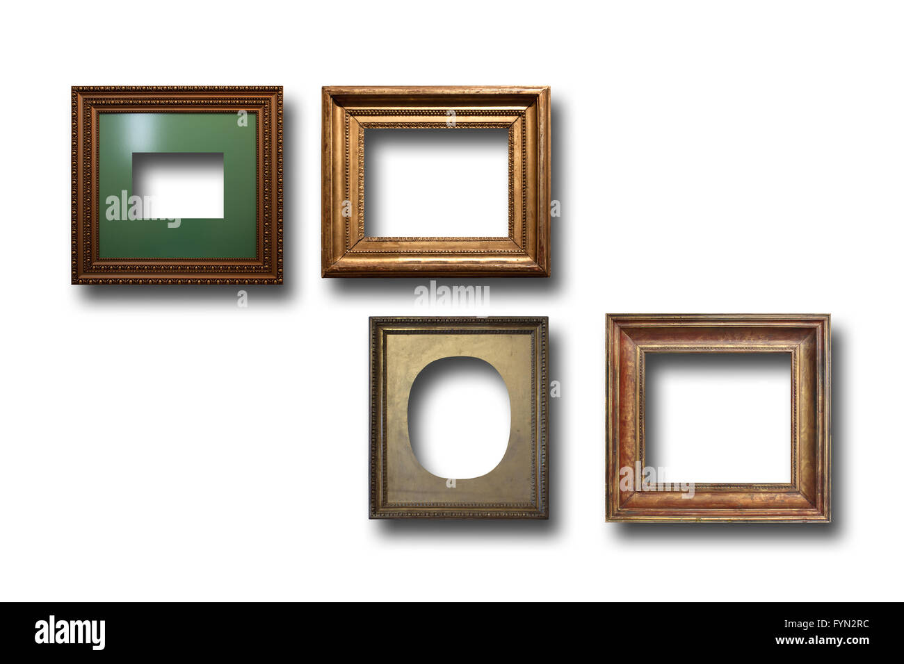 Cadres en bois doré sur fond d'images isolées Banque D'Images
