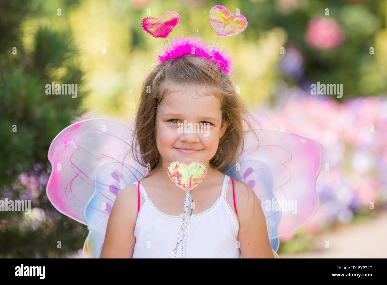 Portrait d'une fée avec une baguette magique Banque D'Images