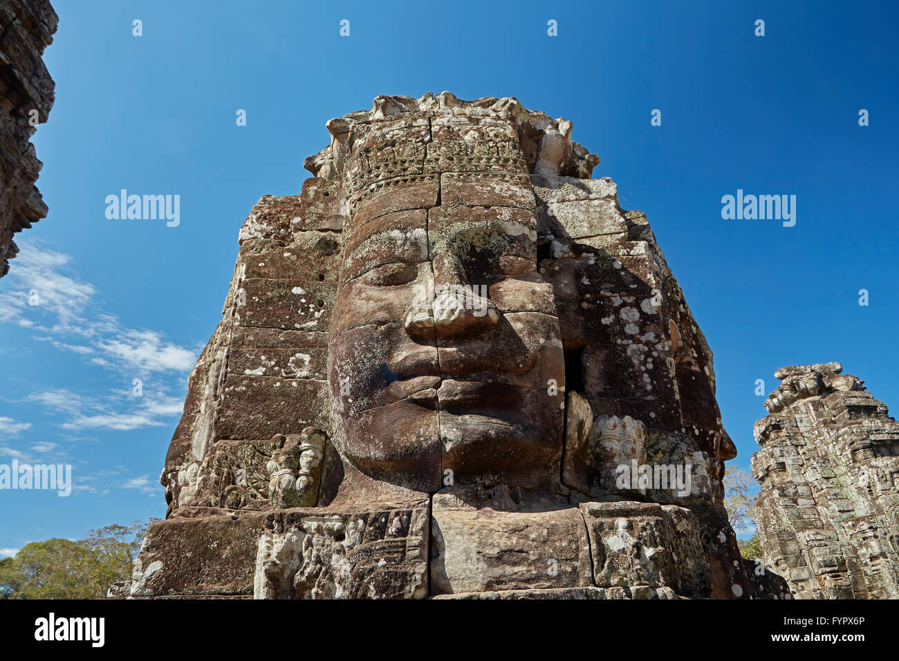 Visage, ruines du temple Bayon, Angkor Thom (12ème siècle temple complexe), site du patrimoine mondial d'Angkor, Siem Reap, Cambodge Banque D'Images