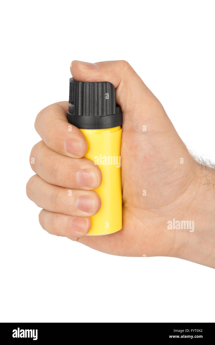 La main avec bouteille de gaz poivré Banque D'Images