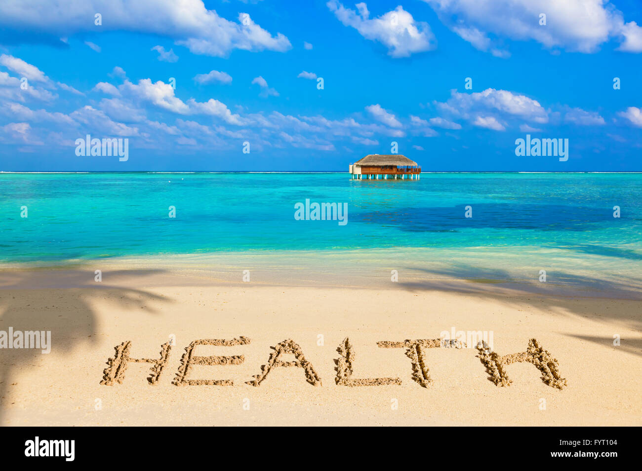 Santé Word on beach Banque D'Images