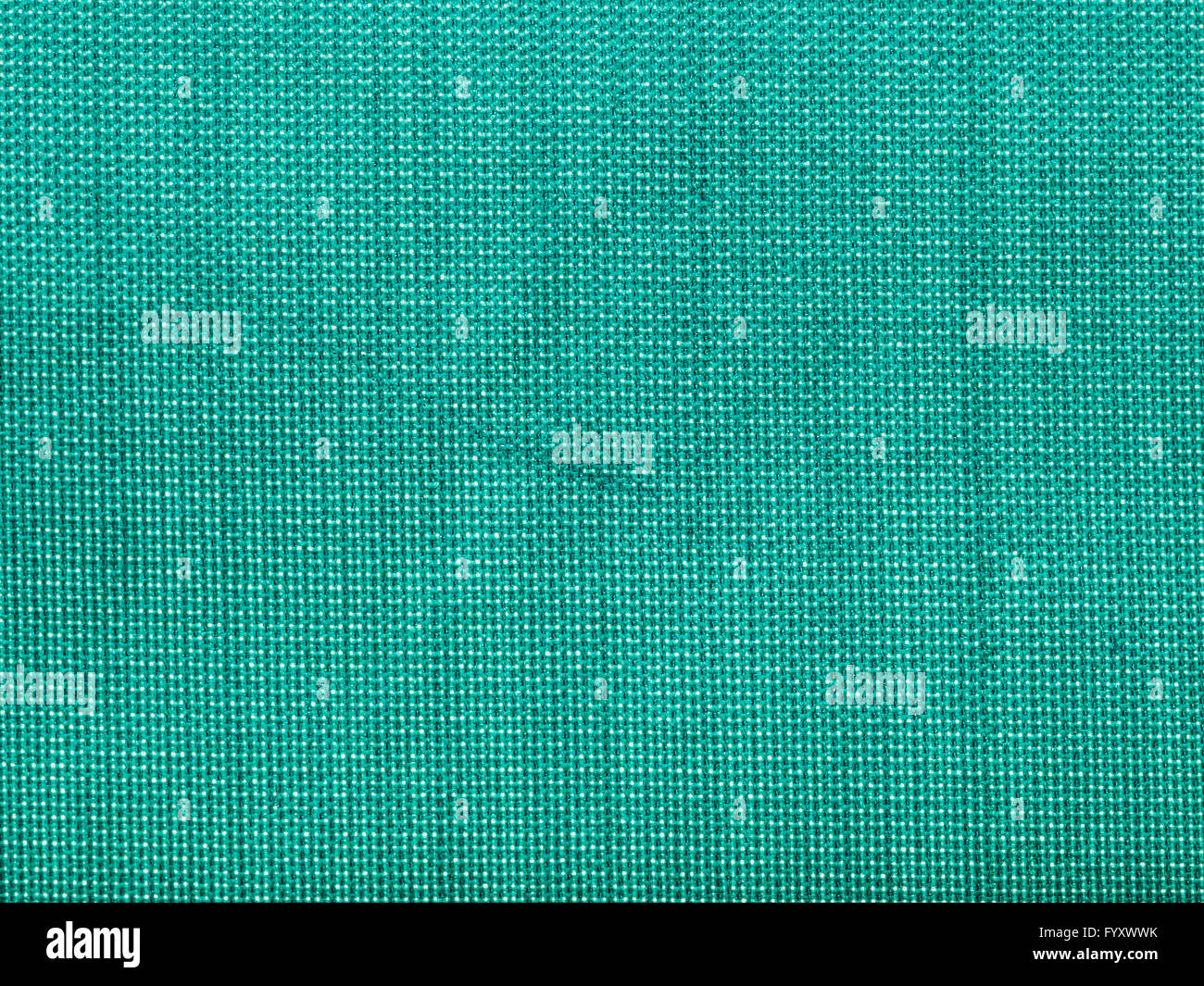Arrière-plan de textiles - Tissus taffetas de soie verte avec motif de tissage de fils close up Banque D'Images