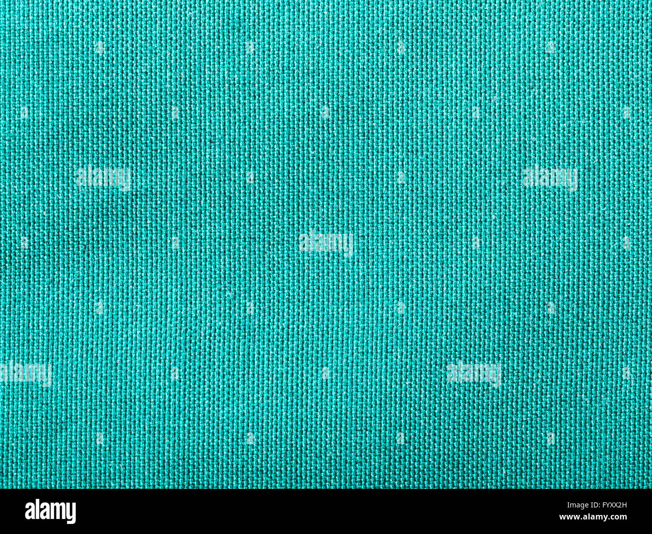 Fond textile - soie taffeta vert tissu avec motif de tissage de fils close up Banque D'Images