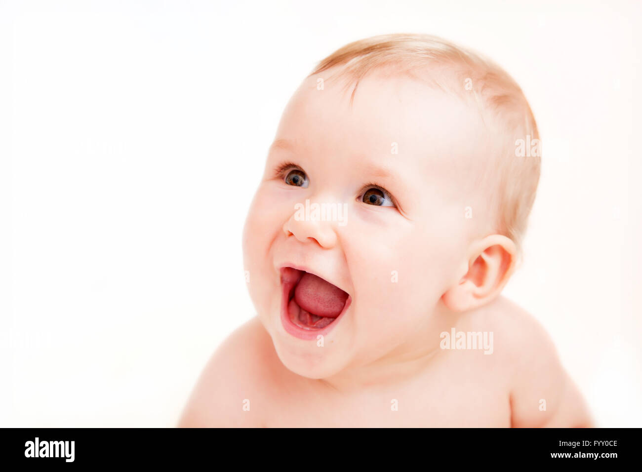 Cute happy baby laughing on white Banque D'Images