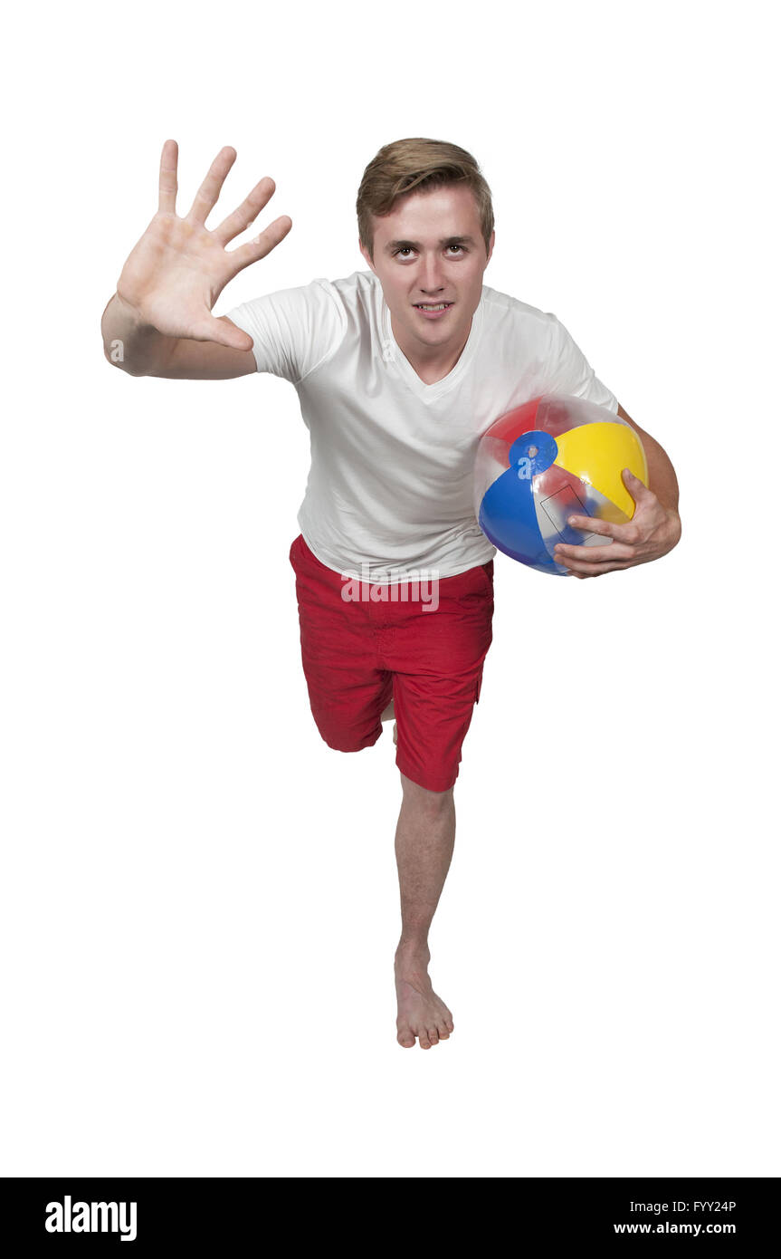 Man Holding Beach Ball Banque D'Images