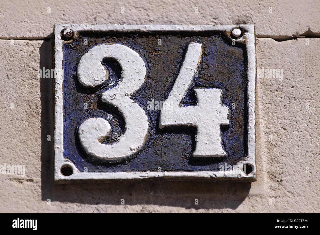 Numéro de la maison sur un mur Banque D'Images