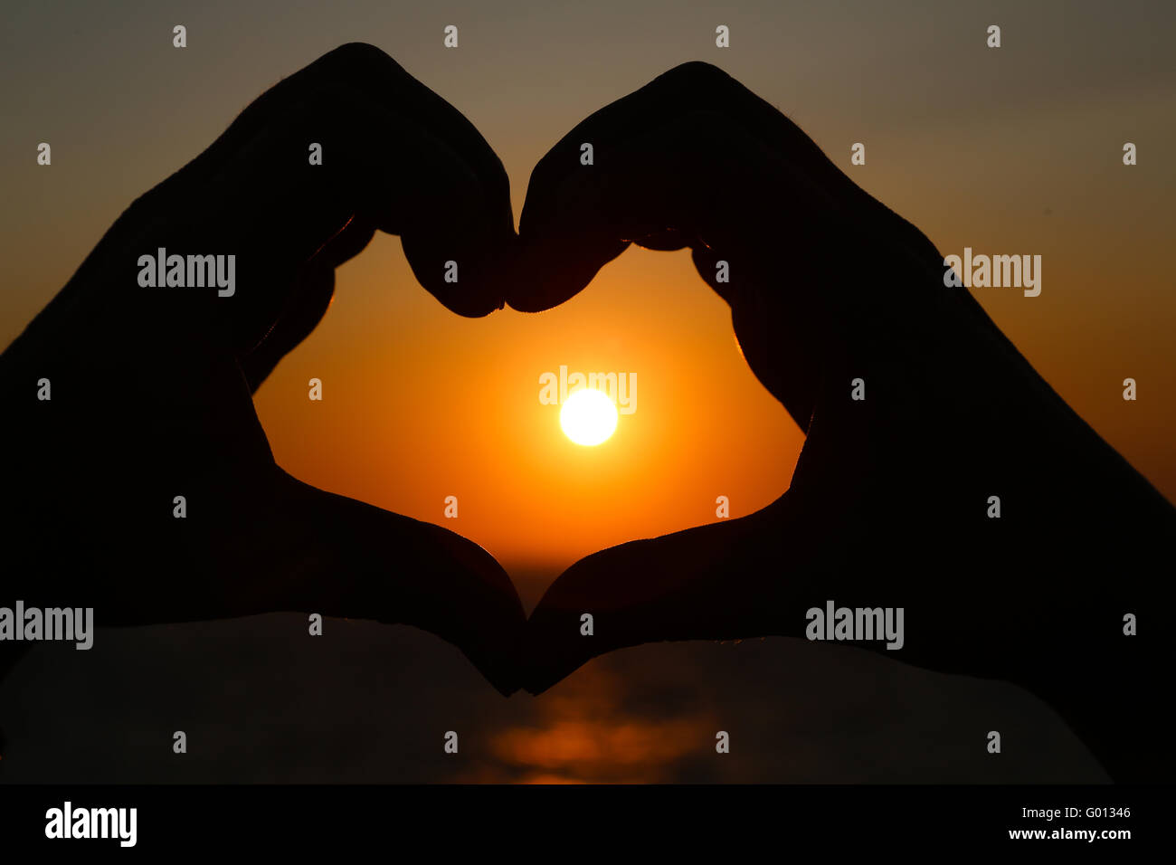 Silhouette Coeur Sunrise Banque D'Images