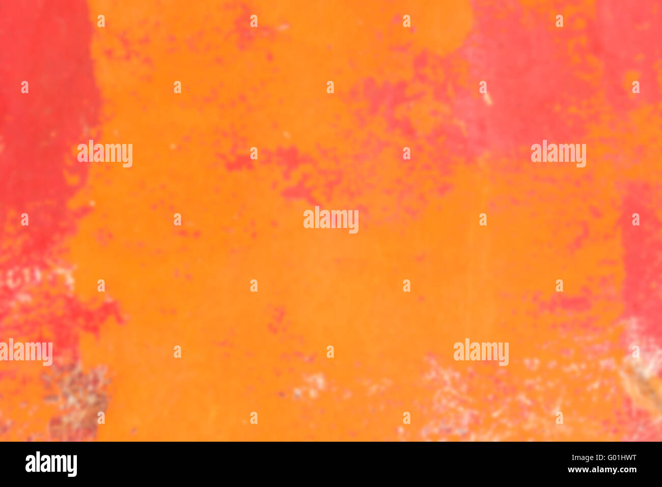 Orange vif de flou artistique en arrière-plan de la surface peinte. Flou horizontal tourné Banque D'Images