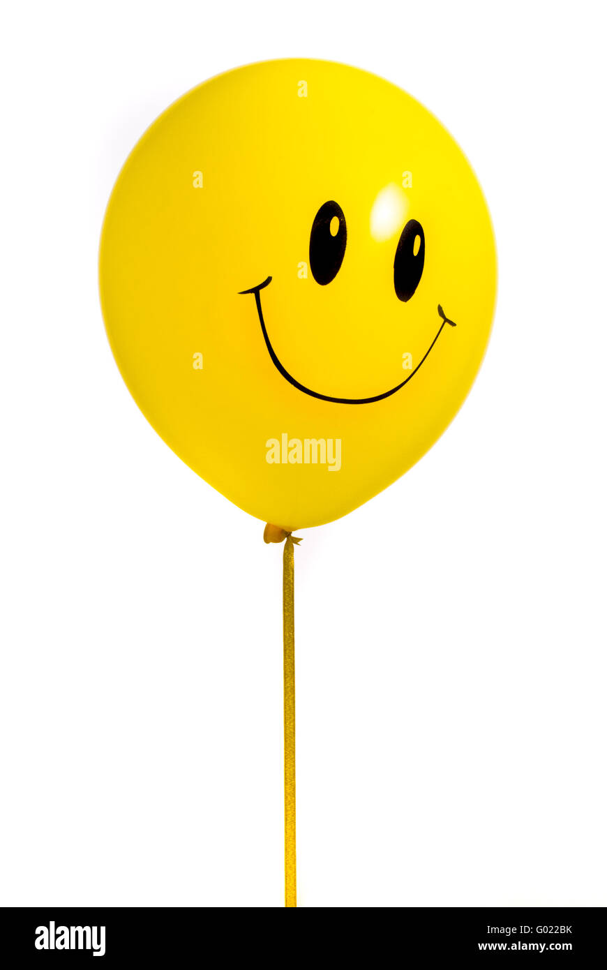 Ballon jaune avec sourire sur fond blanc Banque D'Images