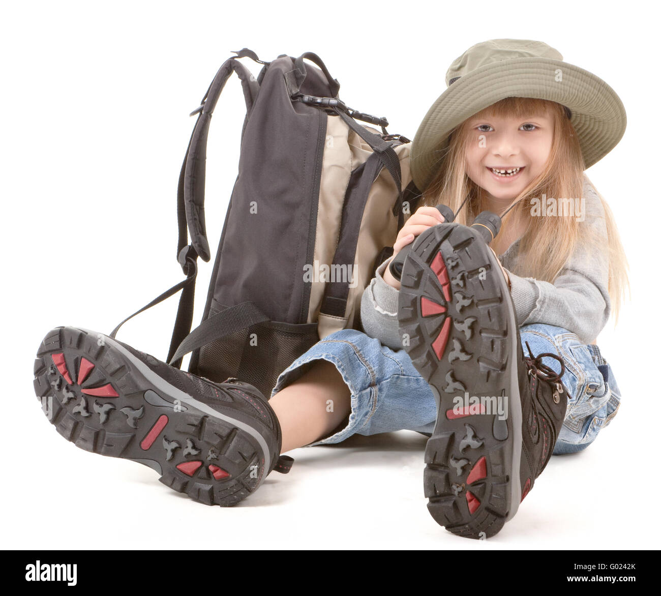 Friendly girl - balades touristiques dans l'habillement on white Banque D'Images