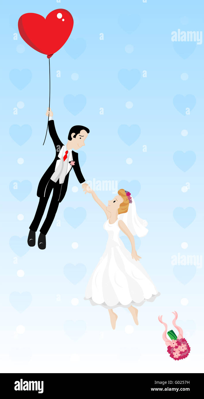 Couple marié à voler avec un ballon en forme de coeur Banque D'Images