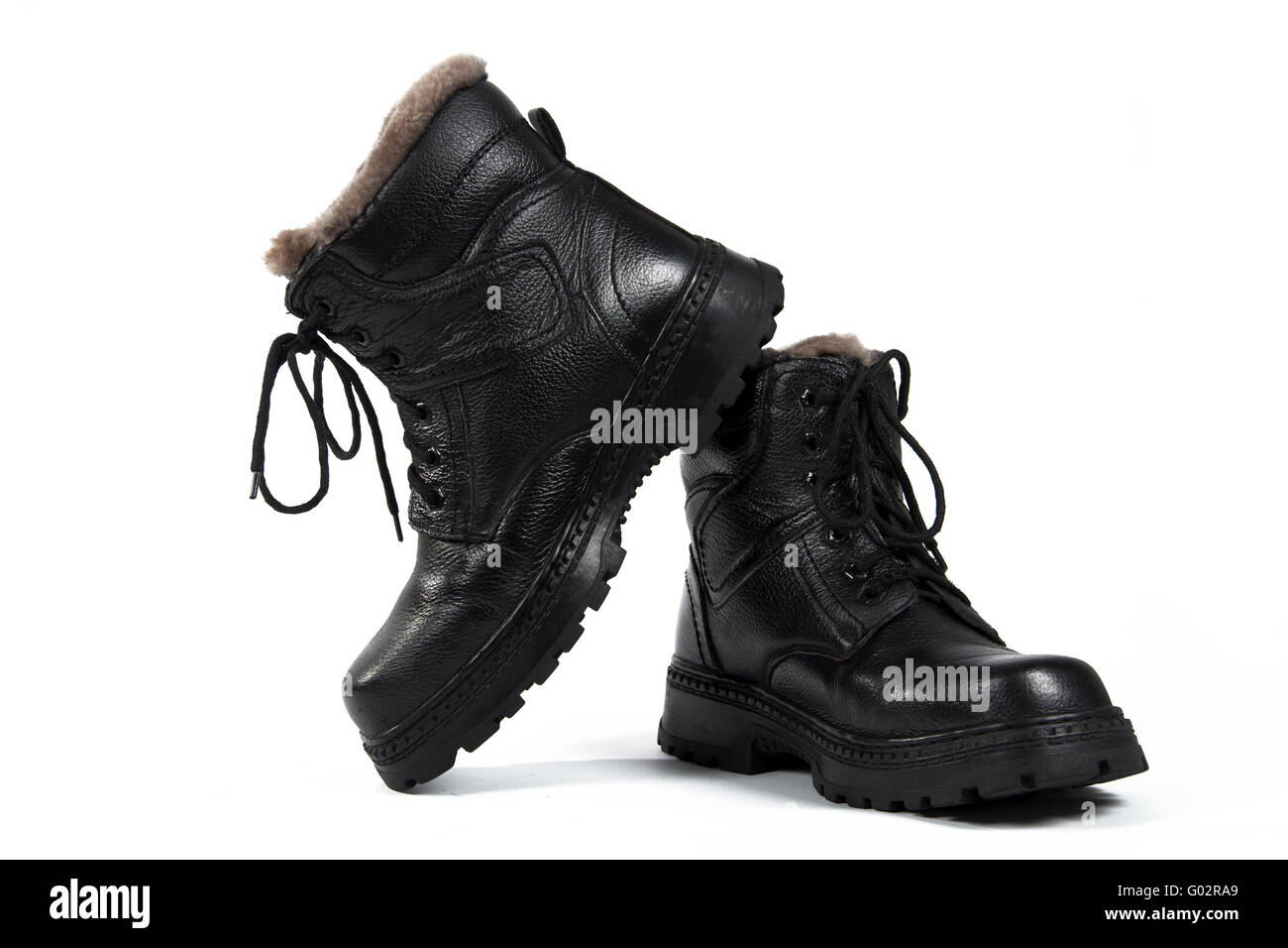 Bottes pour homme noir, sur le fond blanc, isolé Banque D'Images