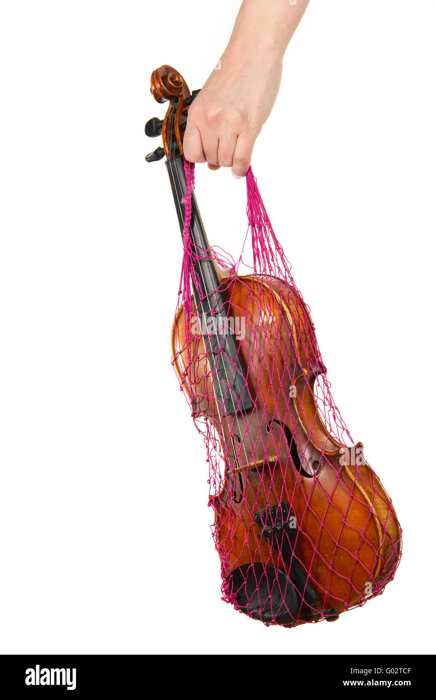 La tenue d'une main de femme maille rouge avec le violon, isolé sur fond blanc Banque D'Images