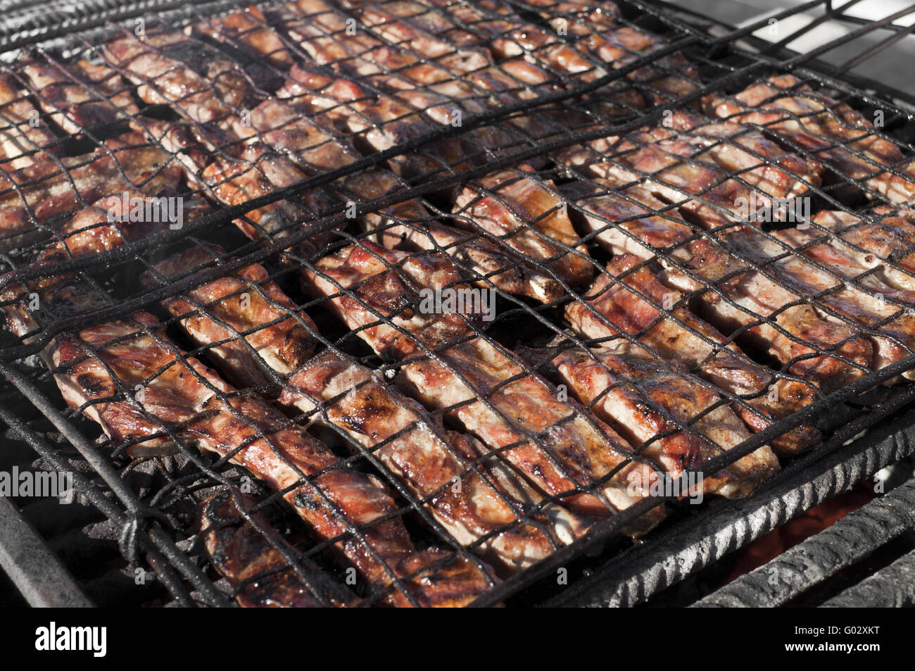 La viande de porc sur un grill barbecue festival italien Banque D'Images
