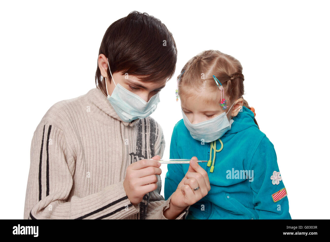 Les enfants malades dans les respirateurs thermometre medical Banque D'Images