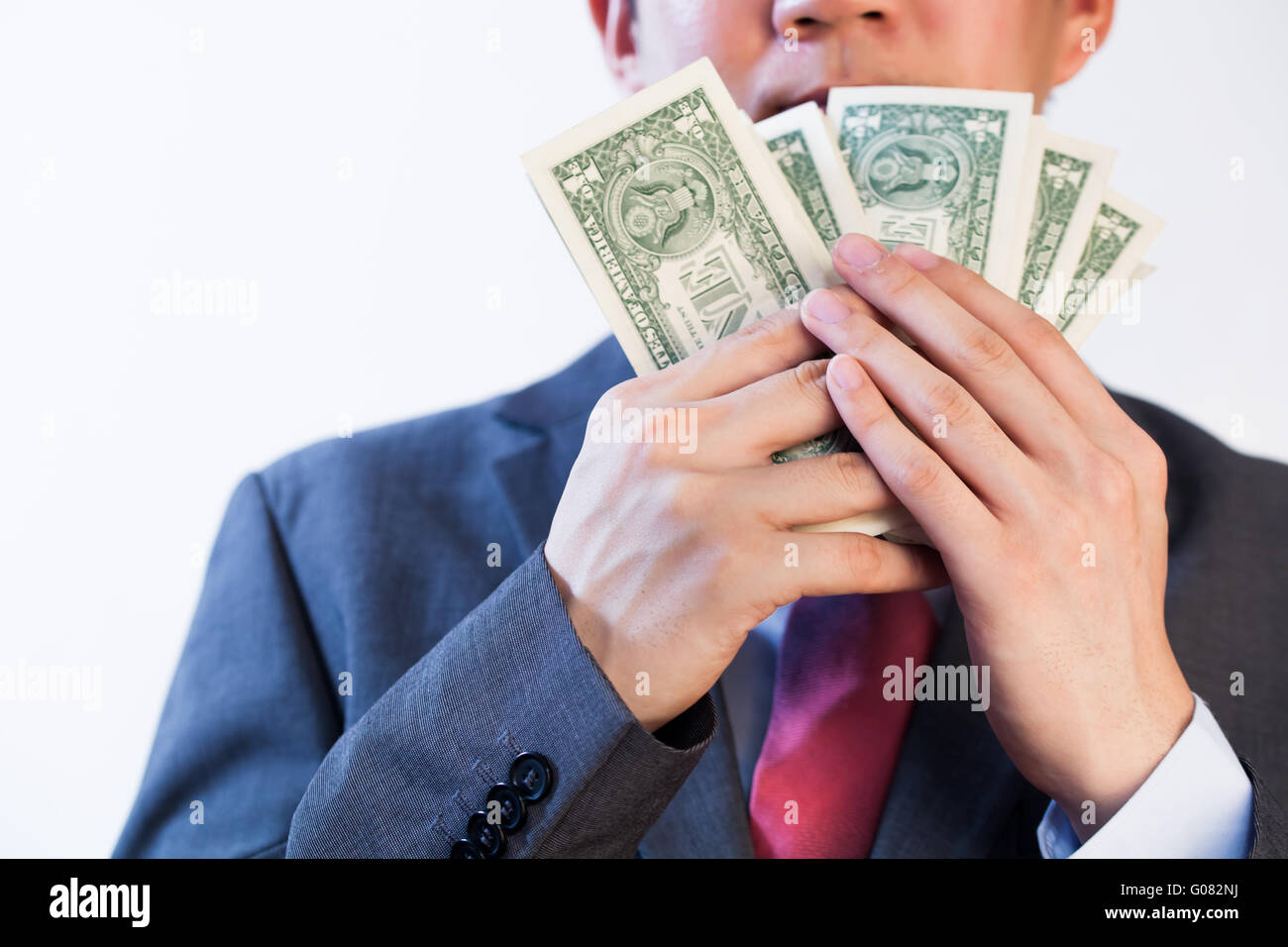 L'homme d'affaires avide de montrer son argent Banque D'Images