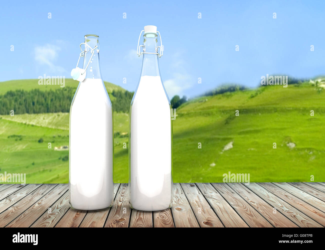 Deux bouteille de lait sur la table en bois Banque D'Images