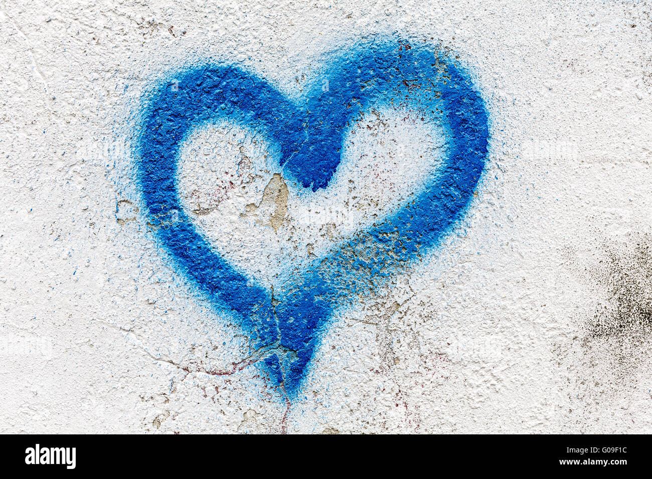 Coeur graffiti sur un mur de brique rendu contexte Banque D'Images