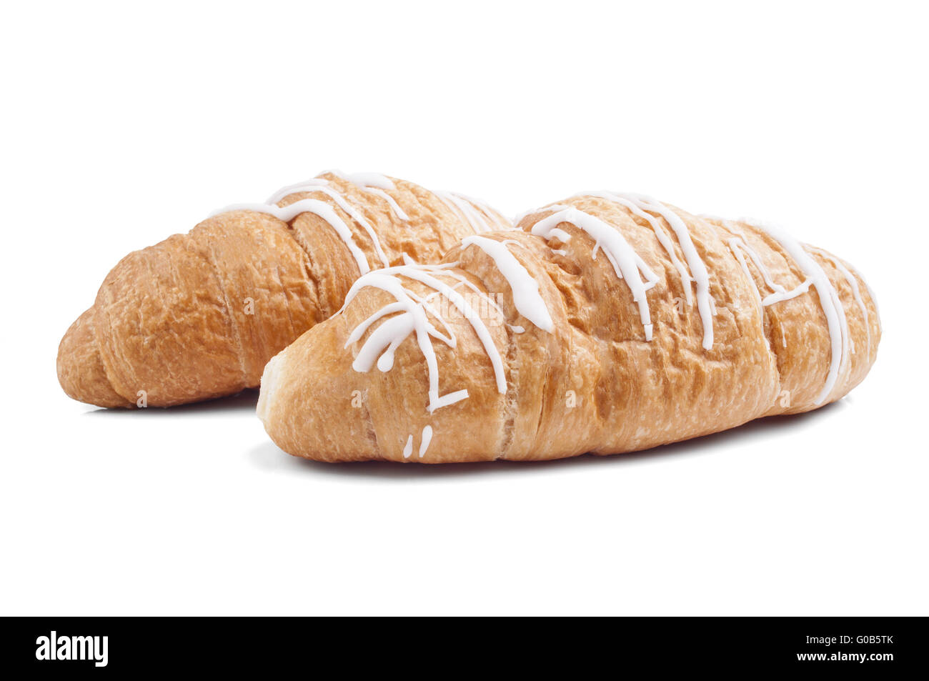 Un croissant frais et savoureux sur fond blanc Banque D'Images