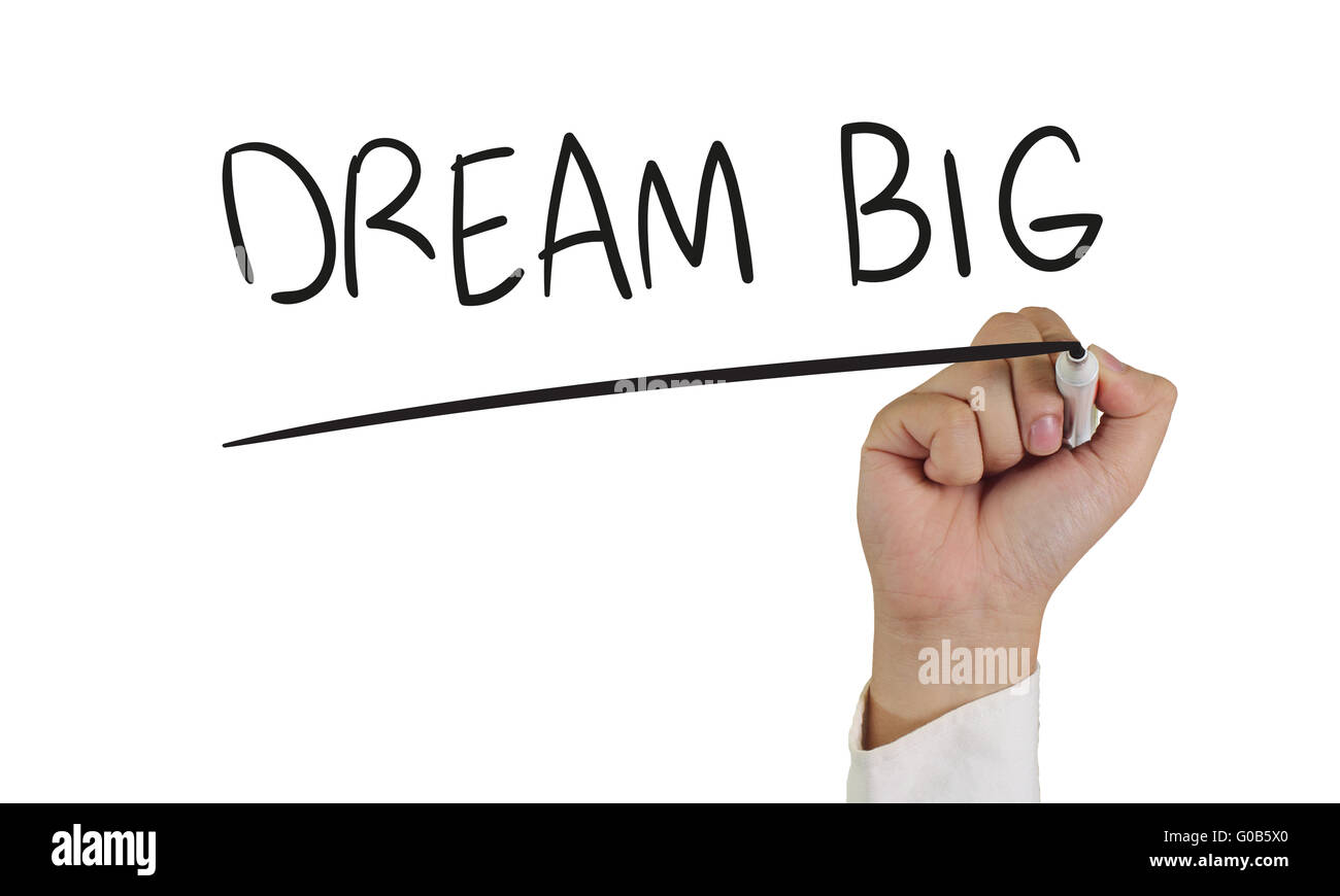 Image concept de motivation d'une main tenant le marqueur et écrire rêver grand isolated on white Banque D'Images