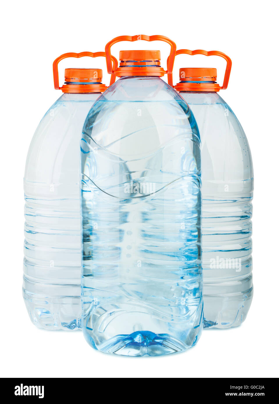 Trois grosses bouteilles d'eau en plastique plein avec orange c Banque D'Images
