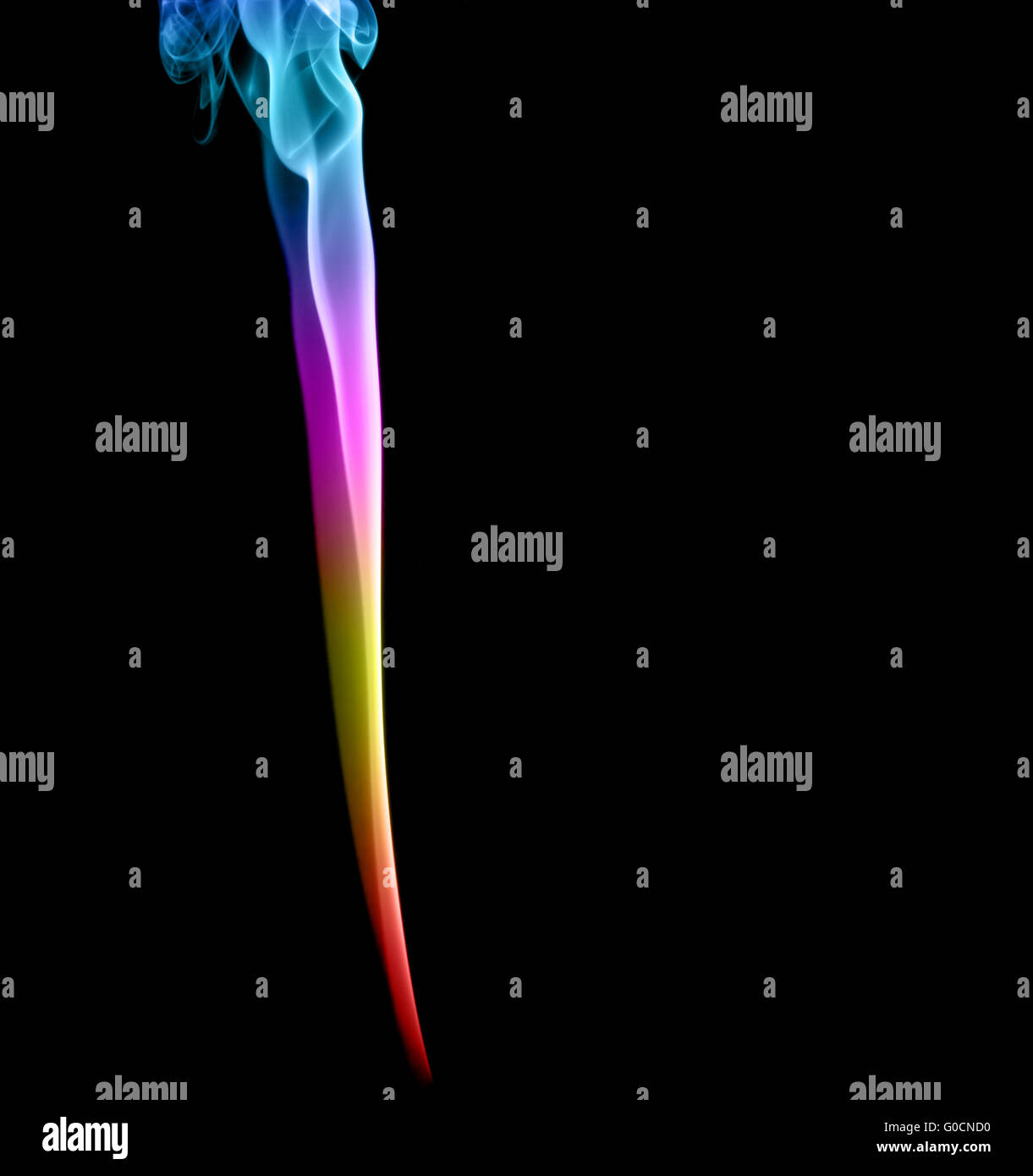 Résumé La fumée multicolore sur fond sombre Banque D'Images