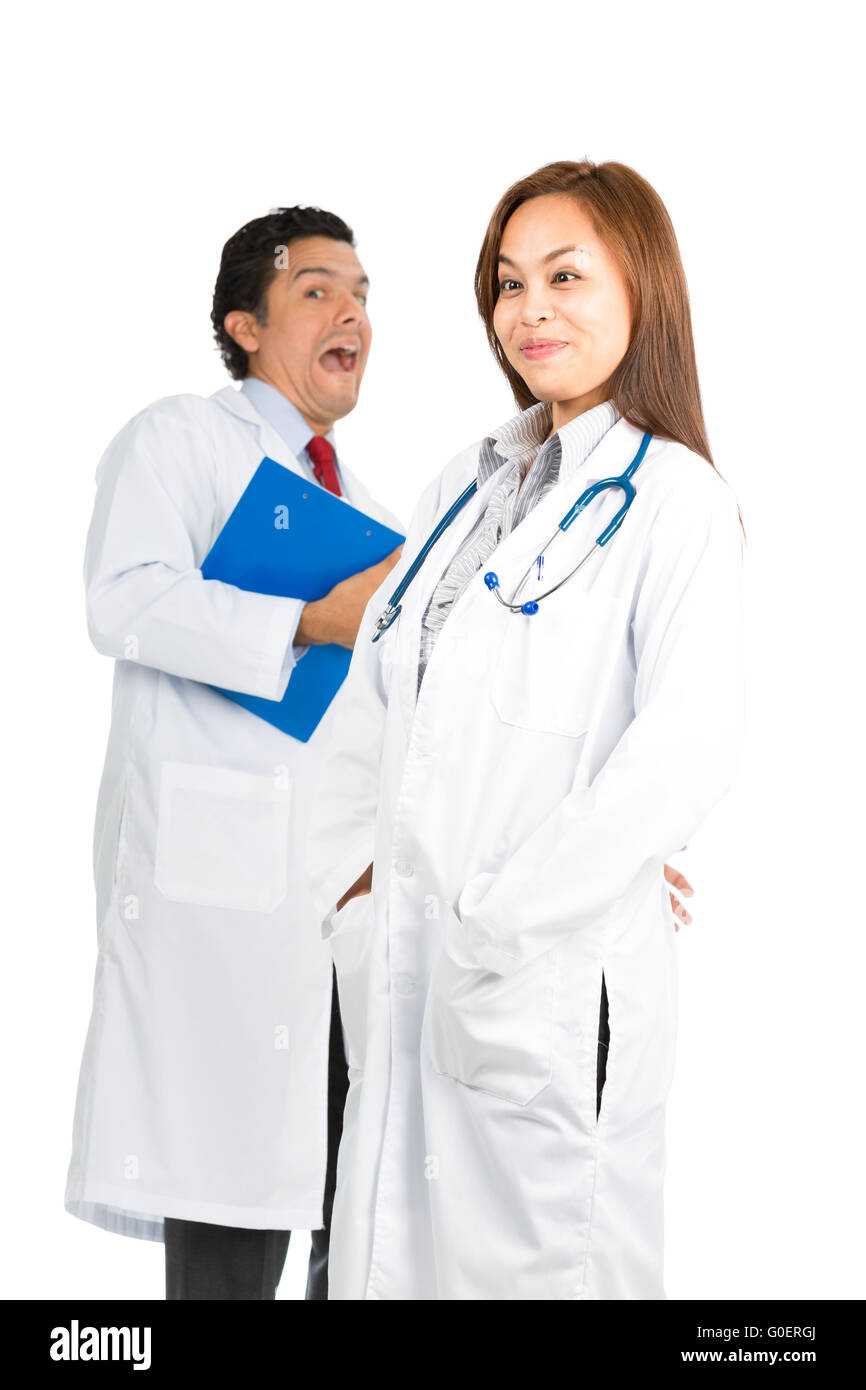 Expressions idiotes Asian Female Hispanic Doctors Banque D'Images
