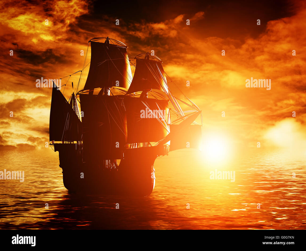 Ancien bateau de pirate naviguant sur l'océan au coucher du soleil. En pleine mer. Banque D'Images