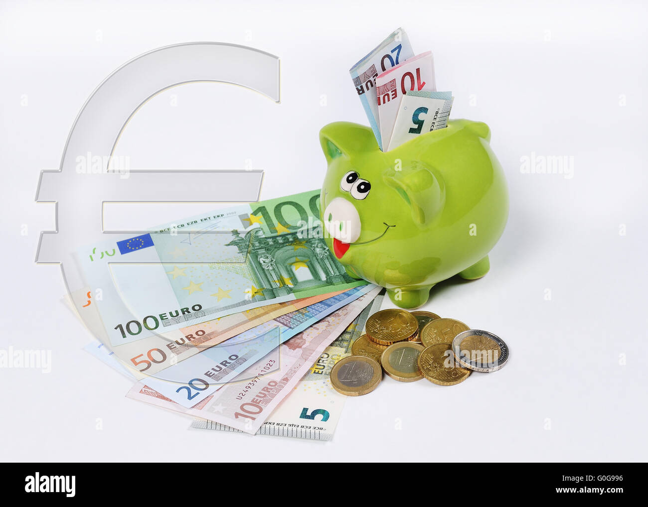 Tirelire avec pièces en euro et euro bill Banque D'Images