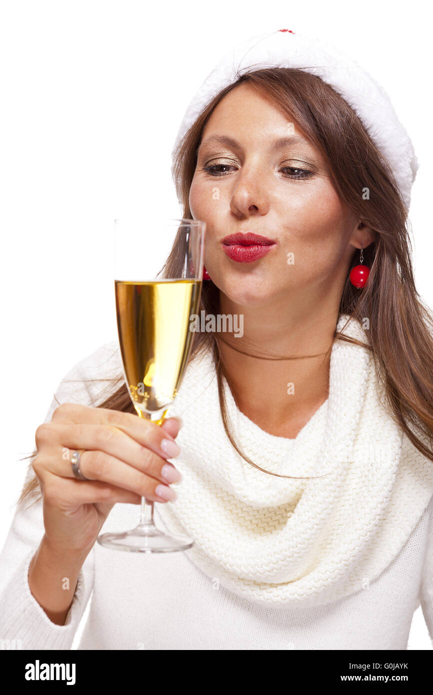 Femme enjouée célébrant Noël blowing a kiss Banque D'Images