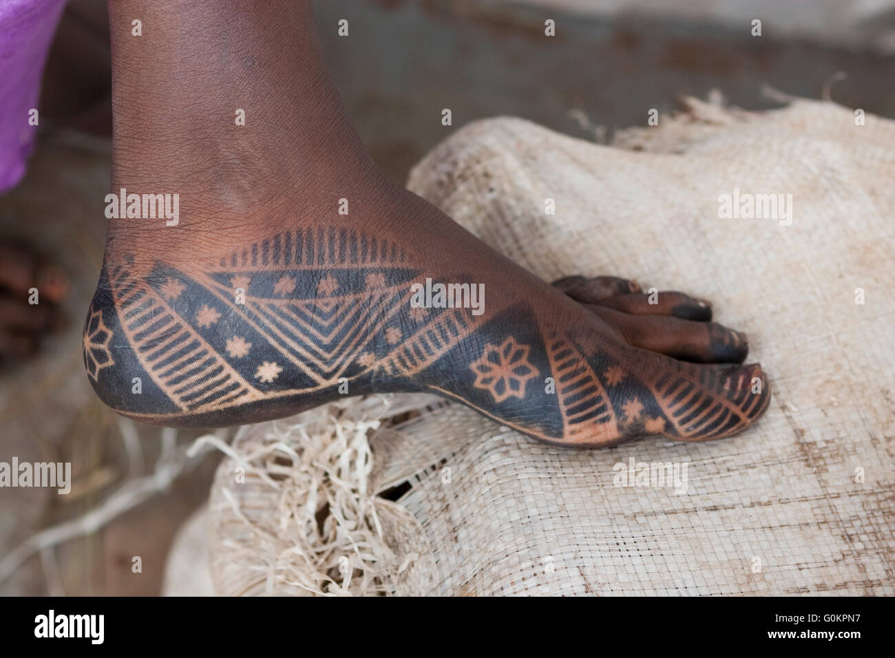 Pieds traditionnelle décoration à Mali, Afrique Banque D'Images