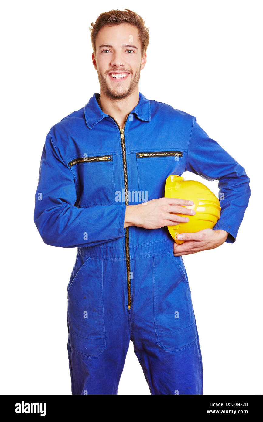 Happy smiling worker en combinaison avec un casque jaune bleu Banque D'Images