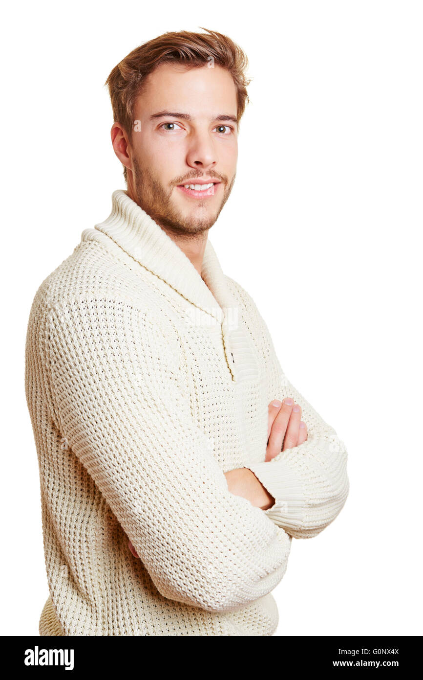 Jeune homme séduisant avec les bras croisés à la recherche dans l'appareil photo Banque D'Images