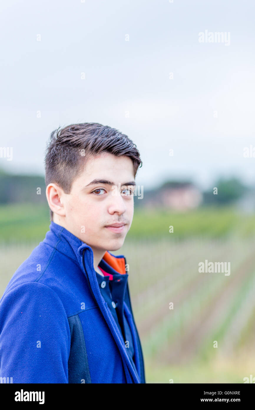 Close up of young boy in countryside Banque D'Images
