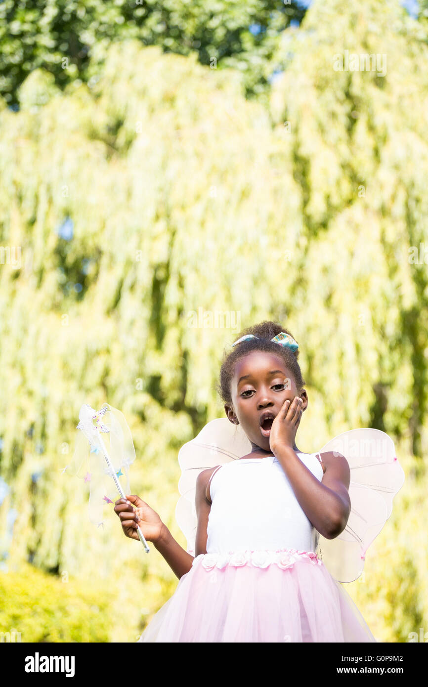 De race mixte cute girl wearing a fairy dress Banque D'Images