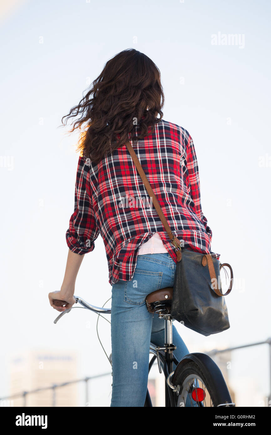 Hipster riding a bike Banque D'Images