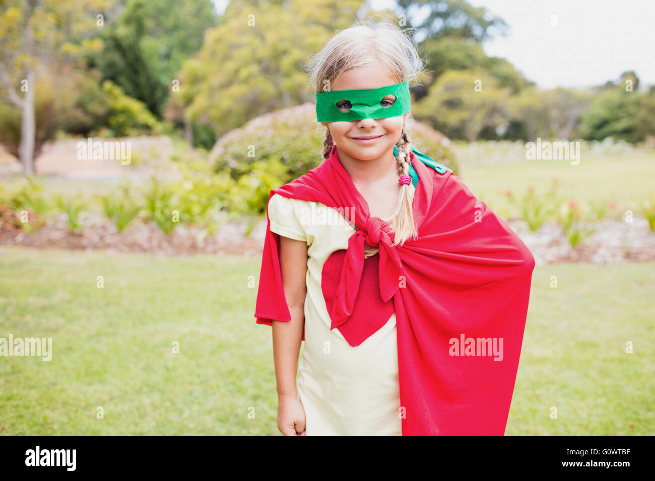 Little girl wearing superhero costume Banque D'Images