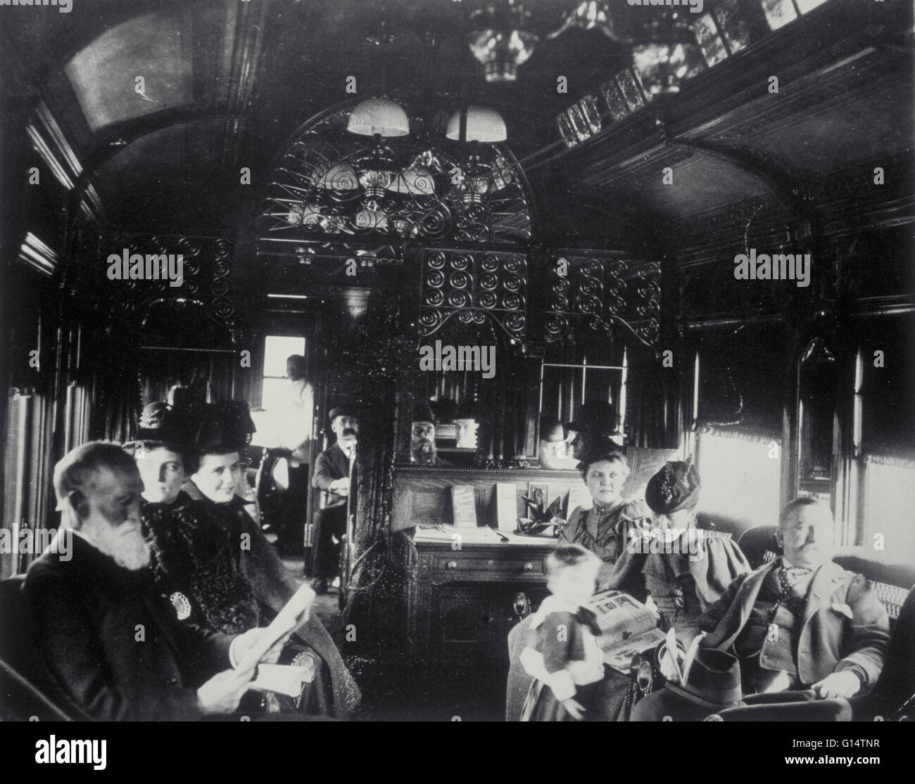 Les passagers à bord du Great Northern Railway's 'de luxe' train de voyageurs. C'était le premier train de passagers de faire la Croix-continental voyage de Chicago à la côte nord-ouest du Pacifique. United States, fin 19e siècle Banque D'Images