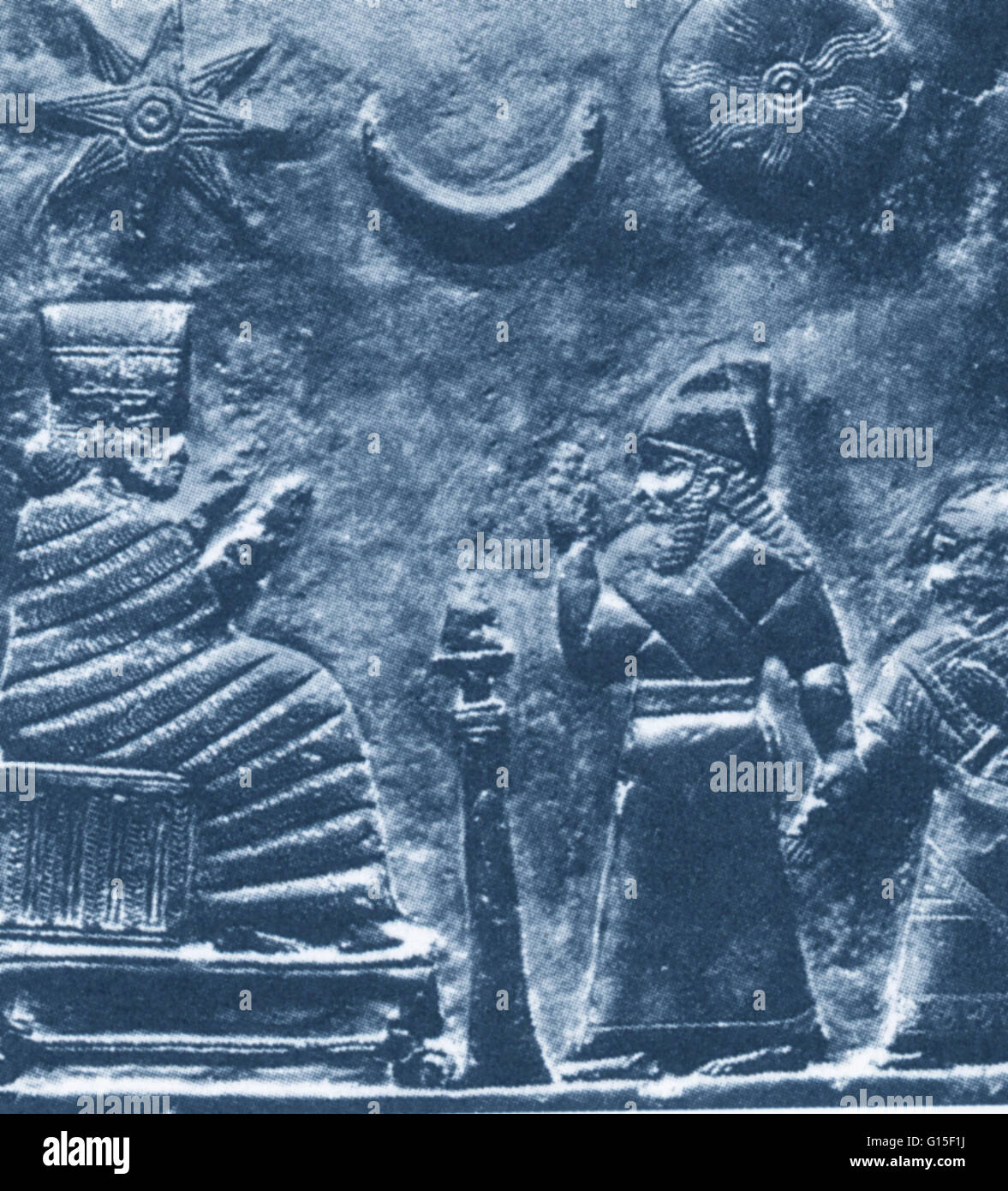 Une borne de Babylone vers 1200 avant J.-C., montrant un roi et sa fille aux pieds d'une déesse ; au-dessus d'eux sont Vénus, la Lune et le soleil. Banque D'Images